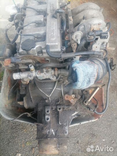Двигатель мазда 626 GF с кпп в сборе