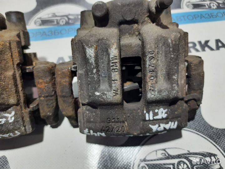 Суппорт тормозной задний левый правый BMW 3-серия