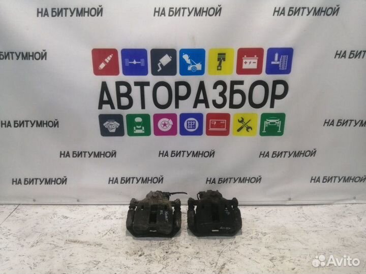 Тормозной суппорт передний Mitsubishi Colt