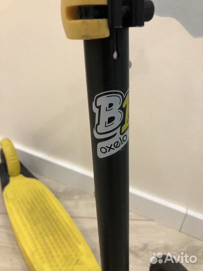 Самокат декатлон оxelo