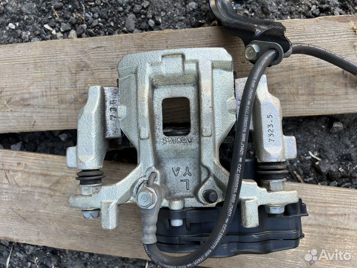 Супорт тормозной задний с электро ручником