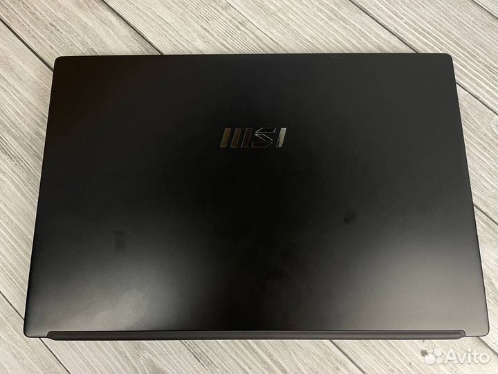 Игровой ноутбук Msi Modern 15 B12M-215XRU