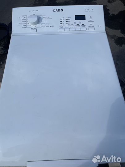 Стиральная машина с вертикальной загрузкой