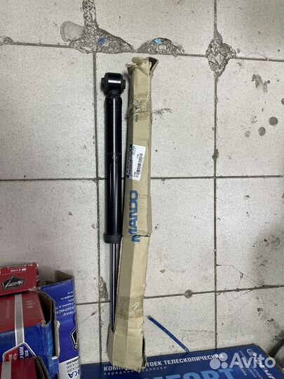 Стойки звдние фирмы mando на hyundai accent