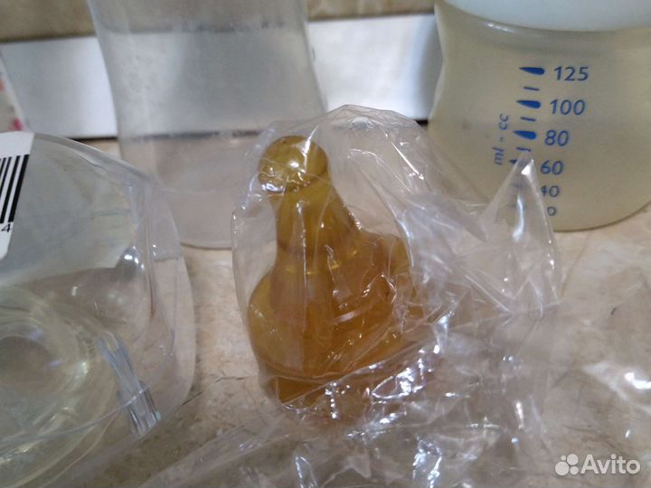 Молоотсос ручной и бутылочки с сосками