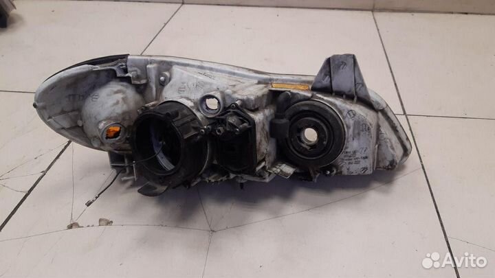 Фара левая Nissan Maxima