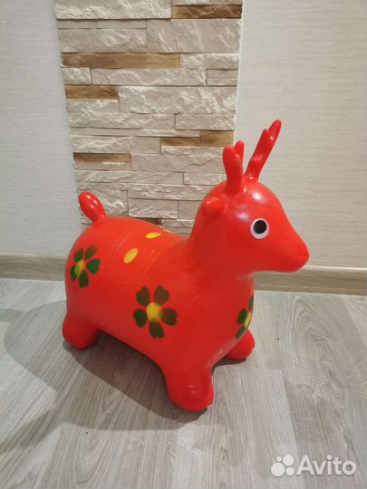 Попрыгун. Игрушка попрыгун. Красный