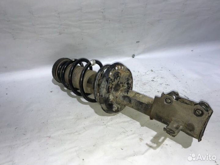 Амортизатор передний левый Chevrolet Cruze J300