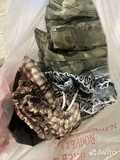 Пакеты с кучей одеждой