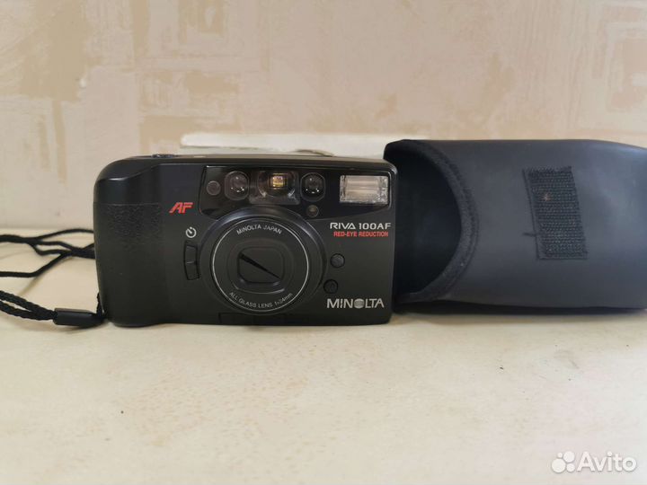 Плёночный фотоаппарат minolta