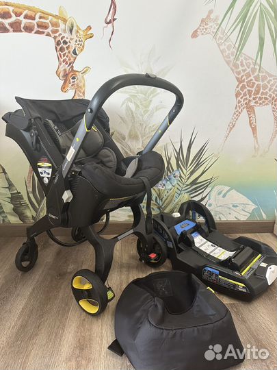 Коляска автокресло Doona с базой isofix
