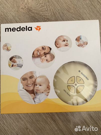 Молокоотсос электрический medela swing maxi