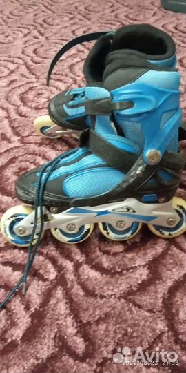 Роликовые коньки