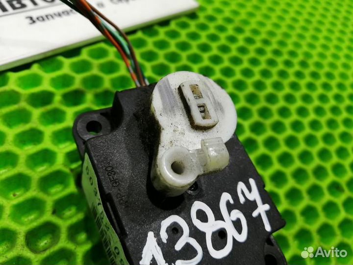 Моторчик заслонки отопителя Nissan Tiida C11