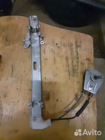 Стеклоподьемник двери Kia Rio 2000