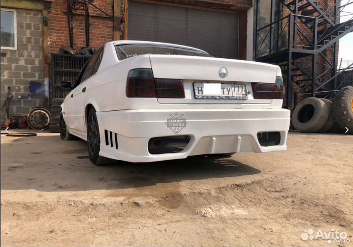 Задний бампер F-design BMW E34