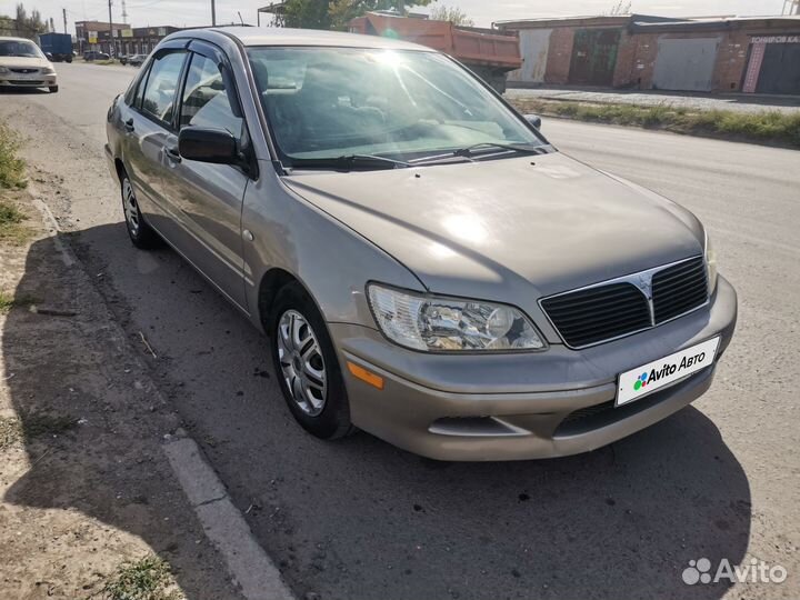 Mitsubishi Lancer 2.0 AT, 2001, 250 000 км