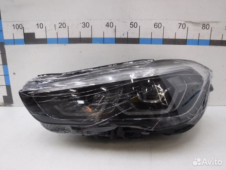 Фара левая BMW X1