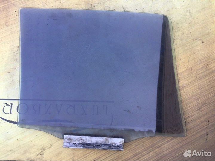 Стекло двери заднее левое Daewoo Nexia sedan 1.5