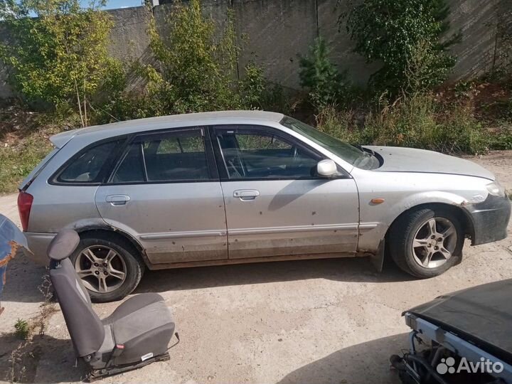 Замок капота Mazda 323 BJ