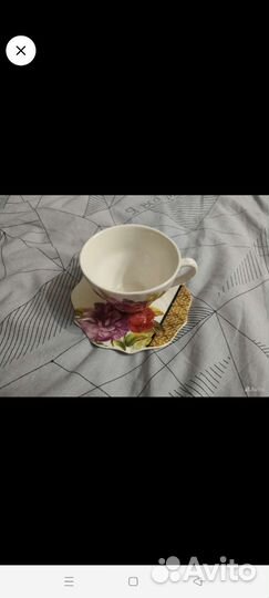 Фарфоровая чашка с блюдцем