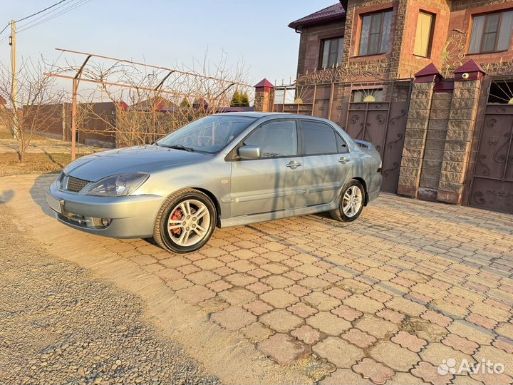 Mitsubishi Lancer 2.0 AT, 2006, 231 500 км