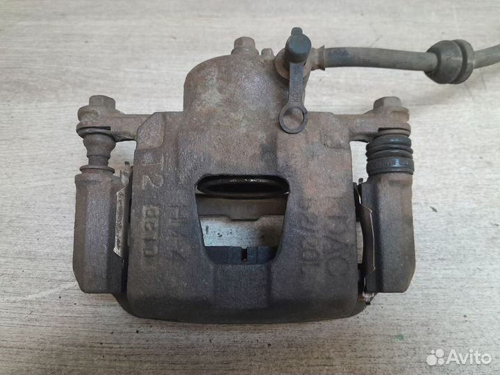 Суппорт передний левый Chevrolet Aveo I рестайлинг