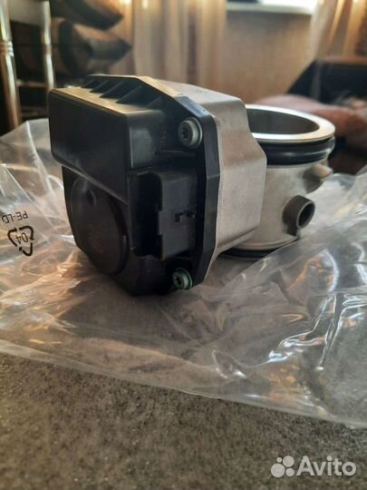 Новая Дросельная заслонка