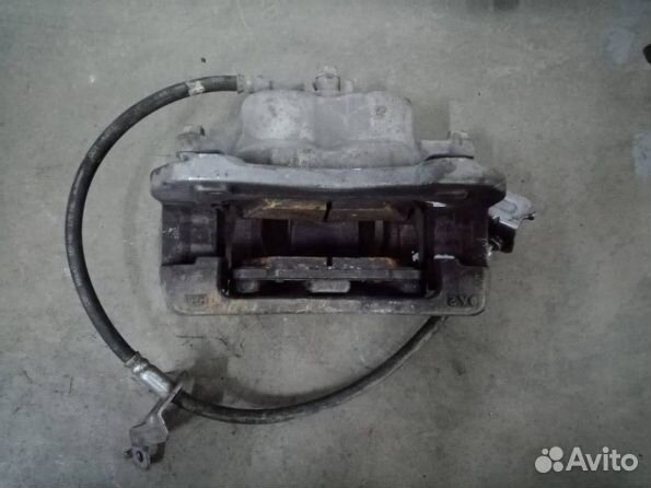 Суппорт передний левый Hyundai Santa Fe 4