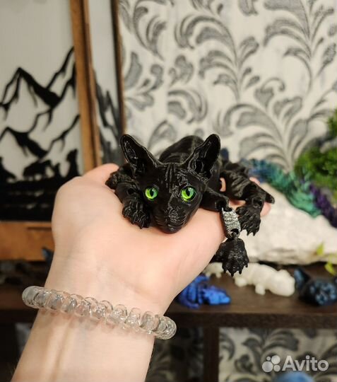 Подвижная игрушка сфинкс