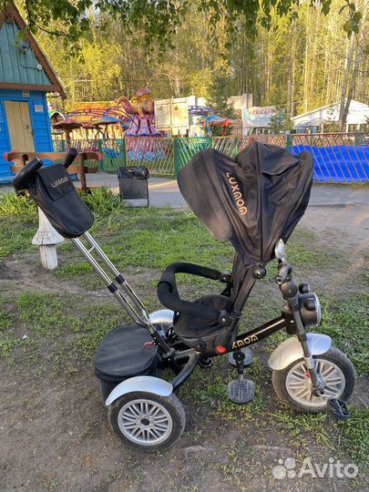 Детский велосипед с ручкой