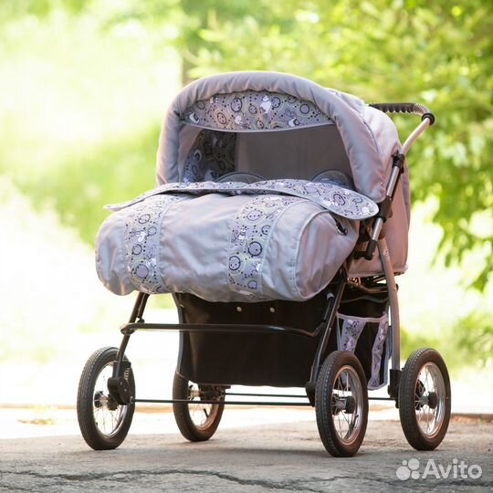 Двухместная коляска