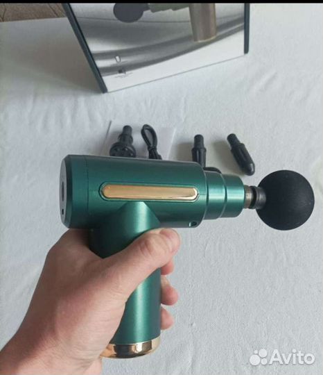 Новый перкуссионный массажер пистолет