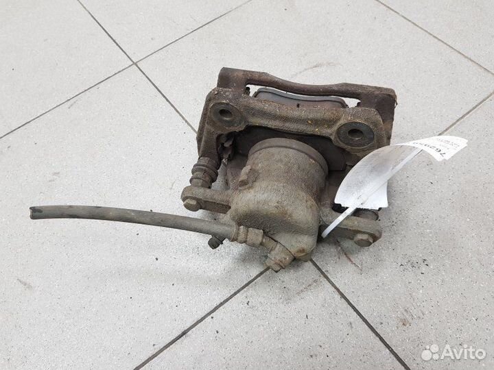 Суппорт тормозной передний правый Nissan Note