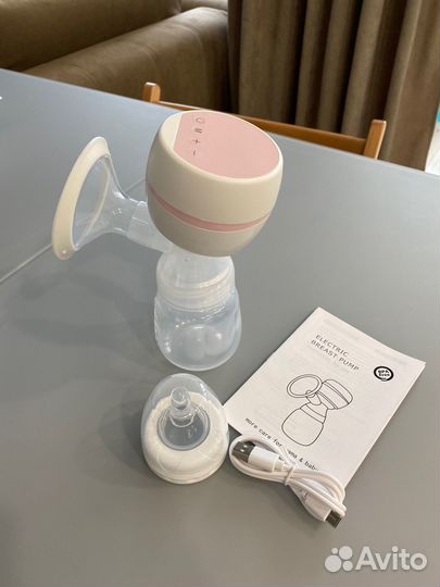Молокоотсос электрический новый