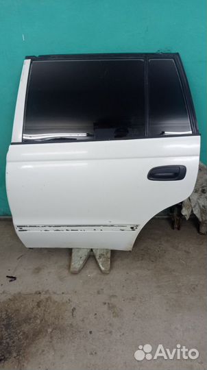 Дверь задняя левая Toyota Caldina