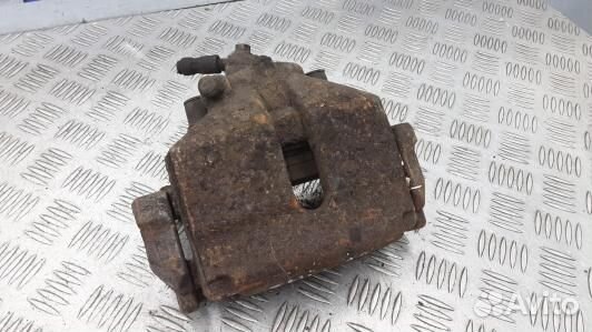 Суппорт тормозной передний правый volkswagen passa