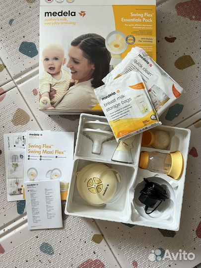 Молокоотсос medela swing flex essentials pack