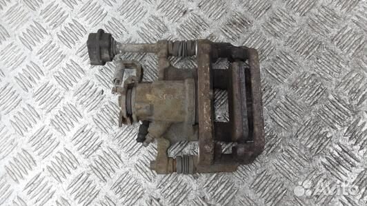 Суппорт тормозной задний правый opel astra J (LEA1