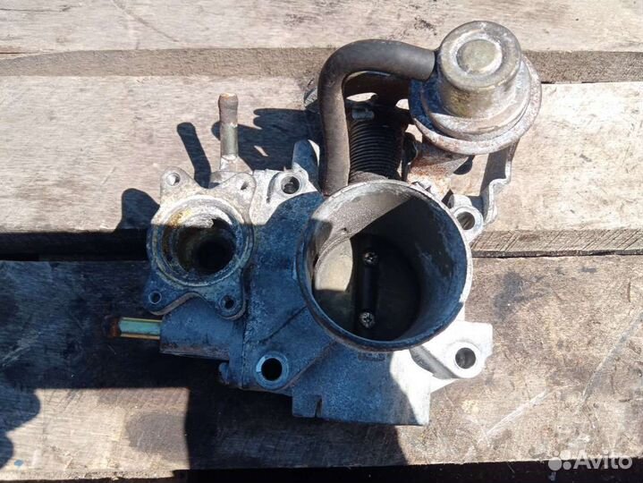 Дроссельная заслонка Nissan Almera N16 AEB20604