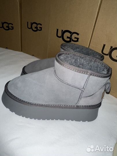 Высокие натуральные угги на высокой подошве