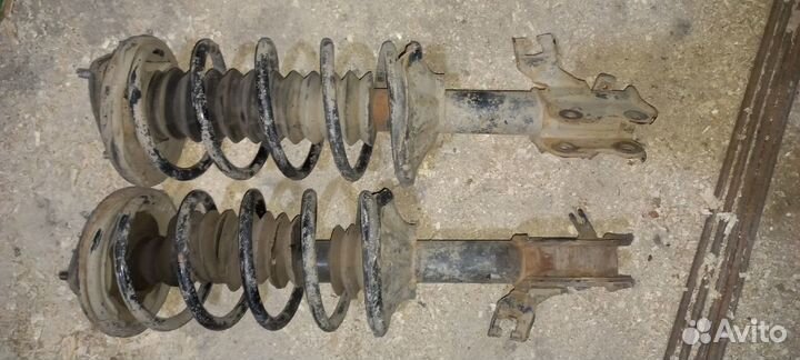 Амортизатор стойка передняя Nissan Pulsar