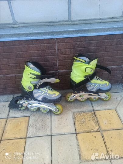 Роликовые коньки