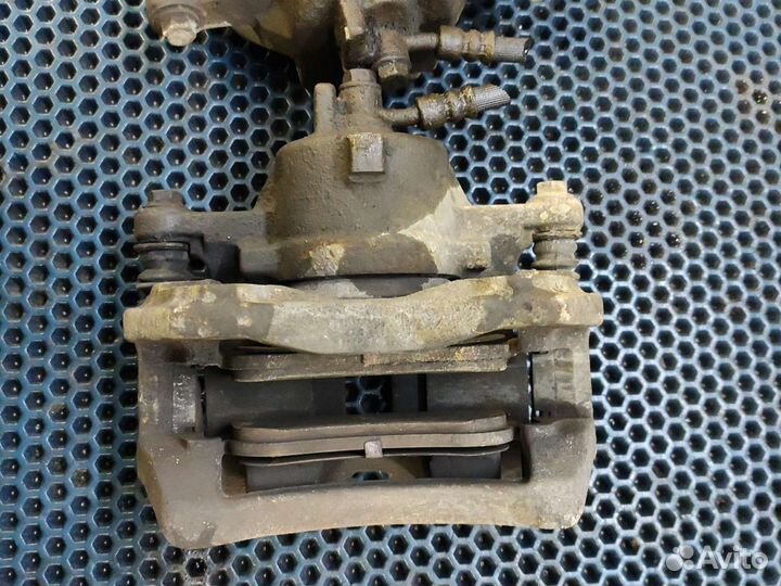 Суппорт передний Nissan almera n16