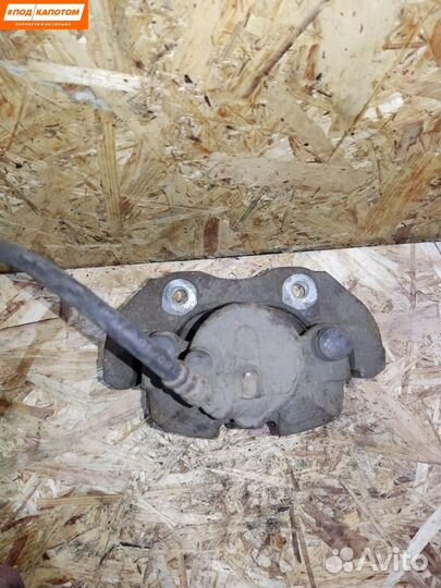 Суппорт тормозной передний правый Mazda 3 BL