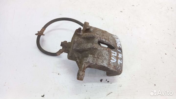 Суппорт передний левый Hyundai Tucson 2