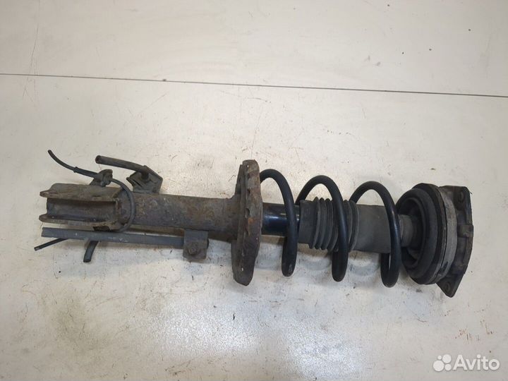 Амортизатор подвески Nissan Note E11, 2008