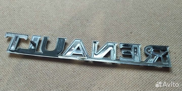 Шильдики Сандеро 1 на дверь багажника