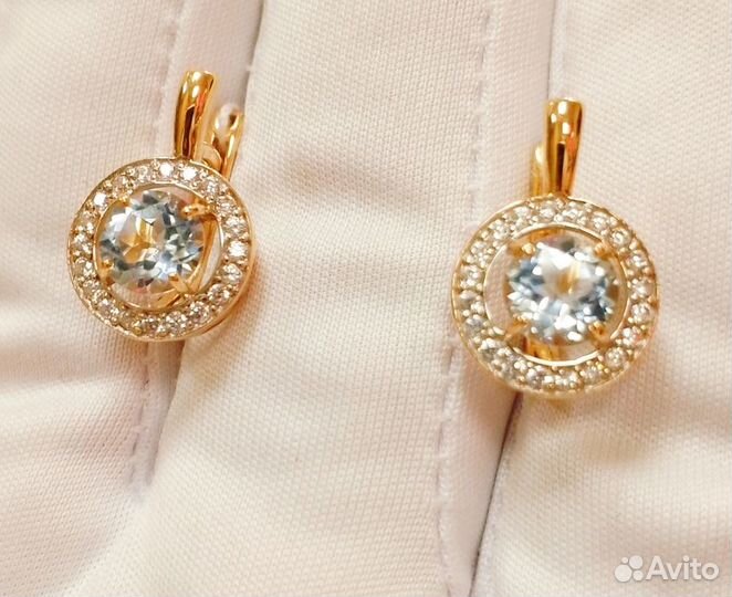 Золотые серьги с камнем