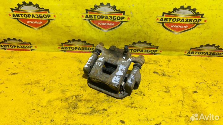 Суппорт задний правый Nissan Qashqai J10